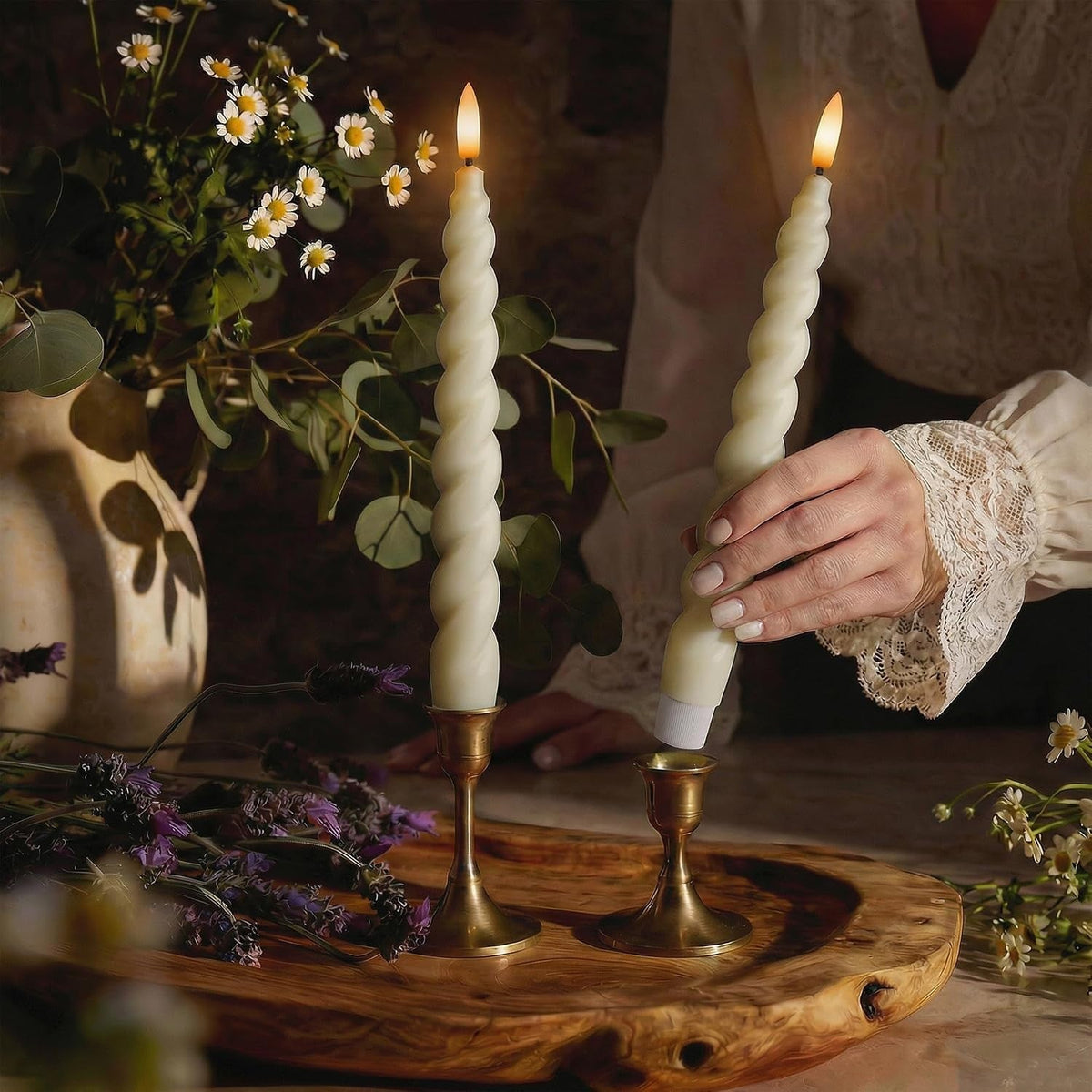 Placing a spiral LED candle into a gold holder
