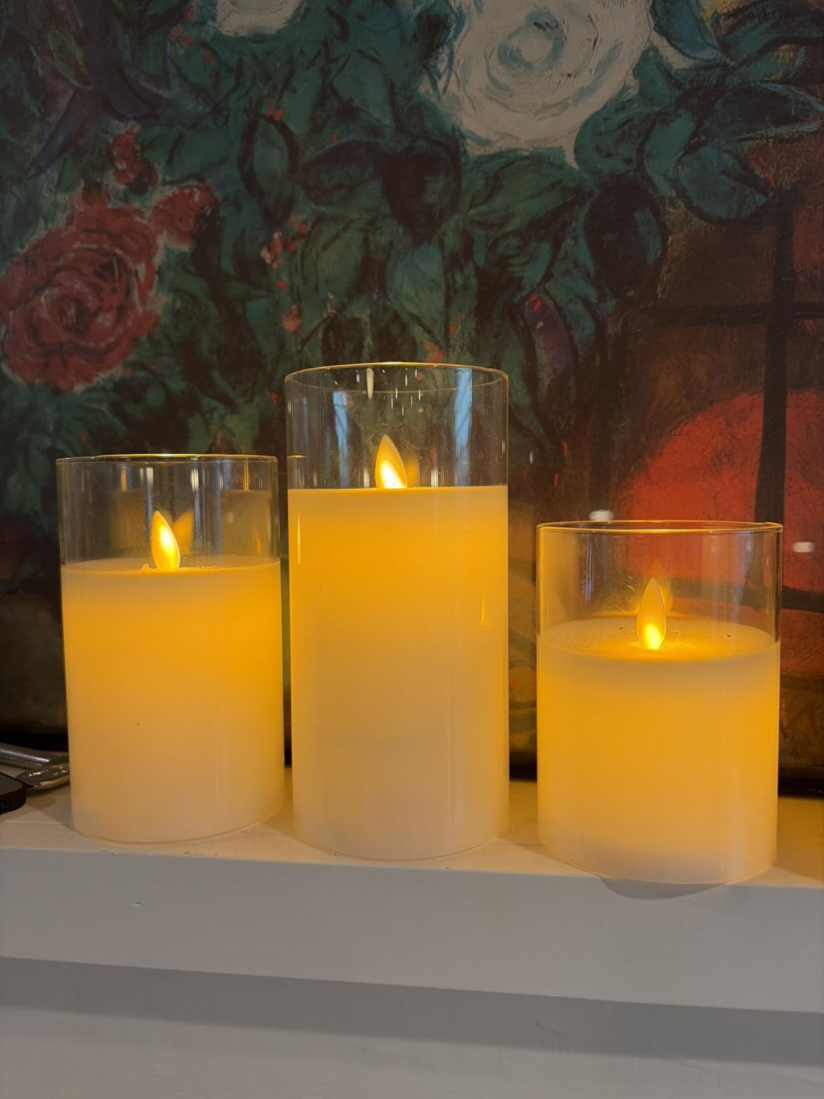 Flameless amber glass pillar candles, set of 3, lit