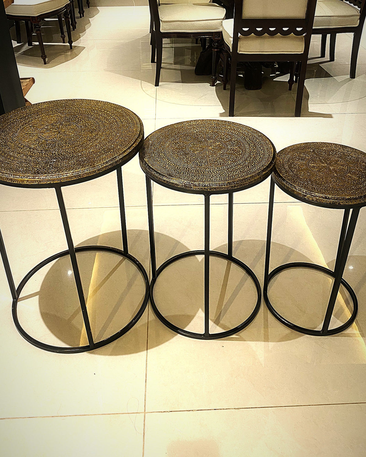 Three mandala nesting tables side by side