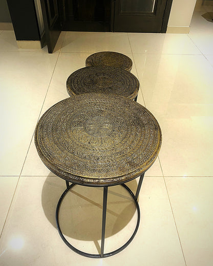 Mandala nesting tables lined up in a hallway